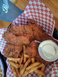 The Getaway Grille and Bar signature dishes Grouper Sandwich
Chicken Tenders
The Big Dog